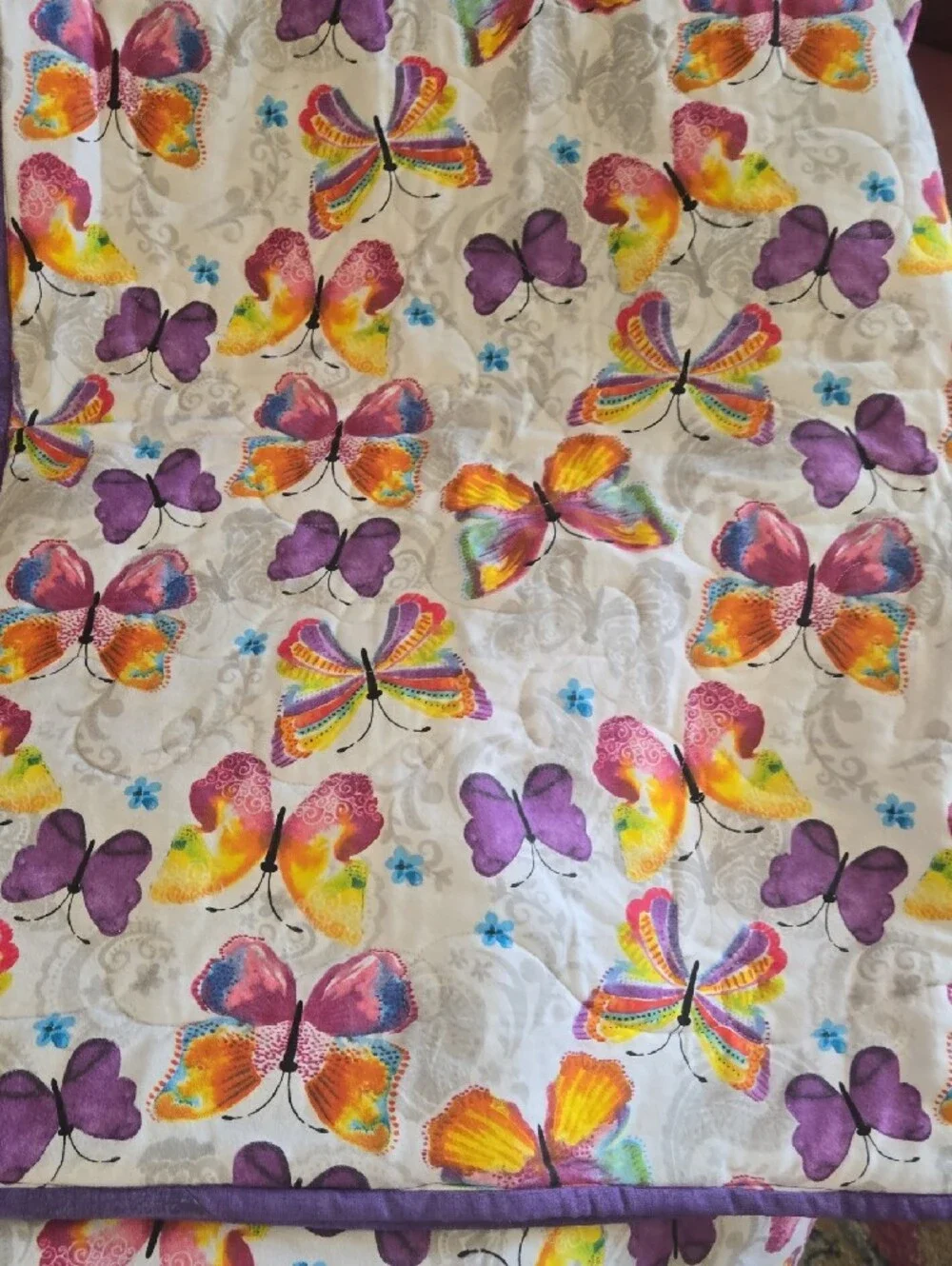 Handmade Patchwork Quilt in Pink and Purple With Butterflies On Reverse Side